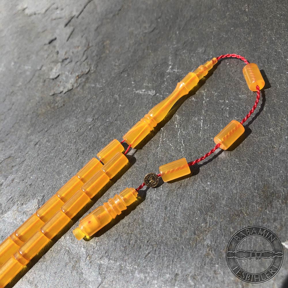 Buğulu sarı 5,5x9,5mm sıkma kehribar kesme model tesbih