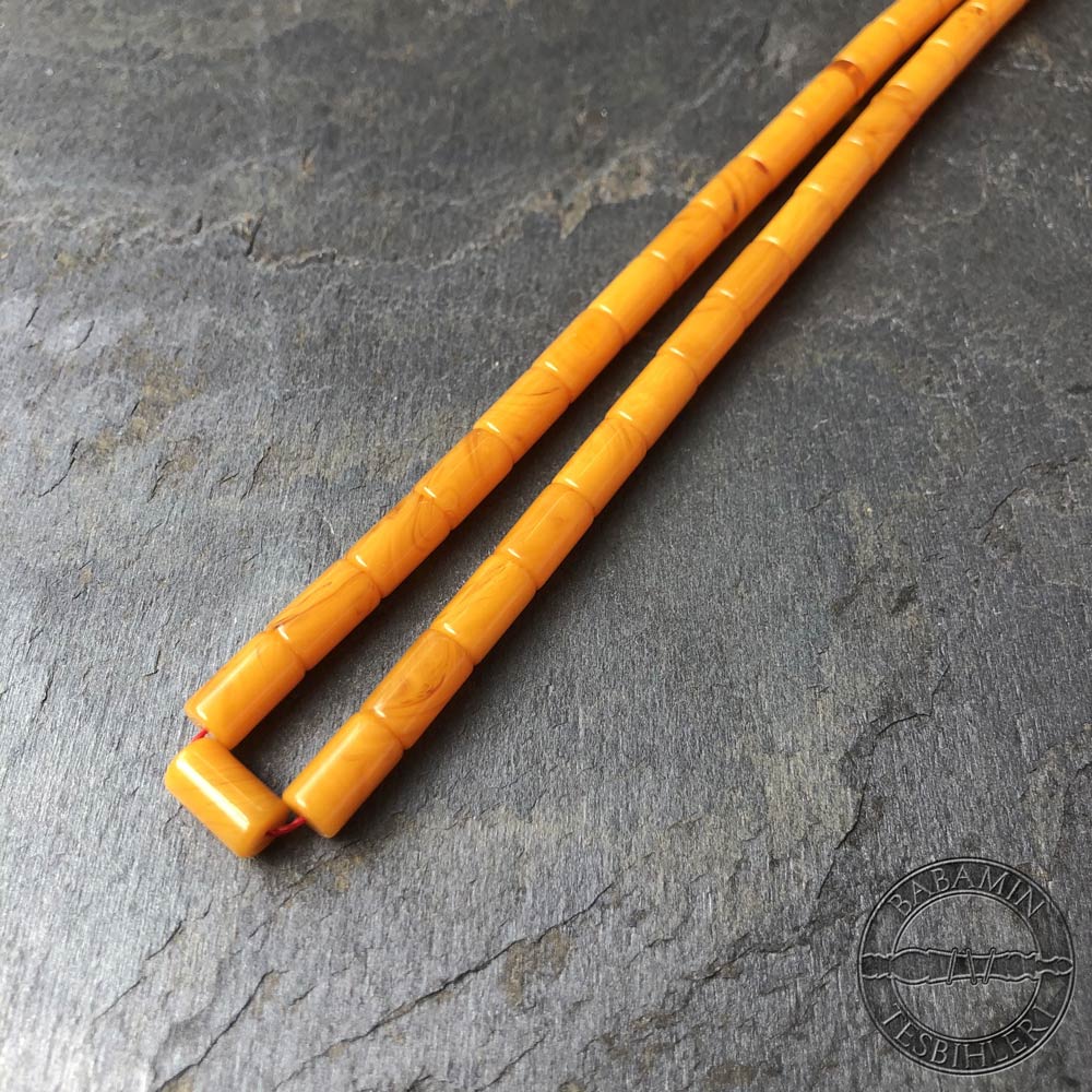 Sarı gümüş püsküllü 5,5x9,5mm sıkma kehribar kesme model tesbih