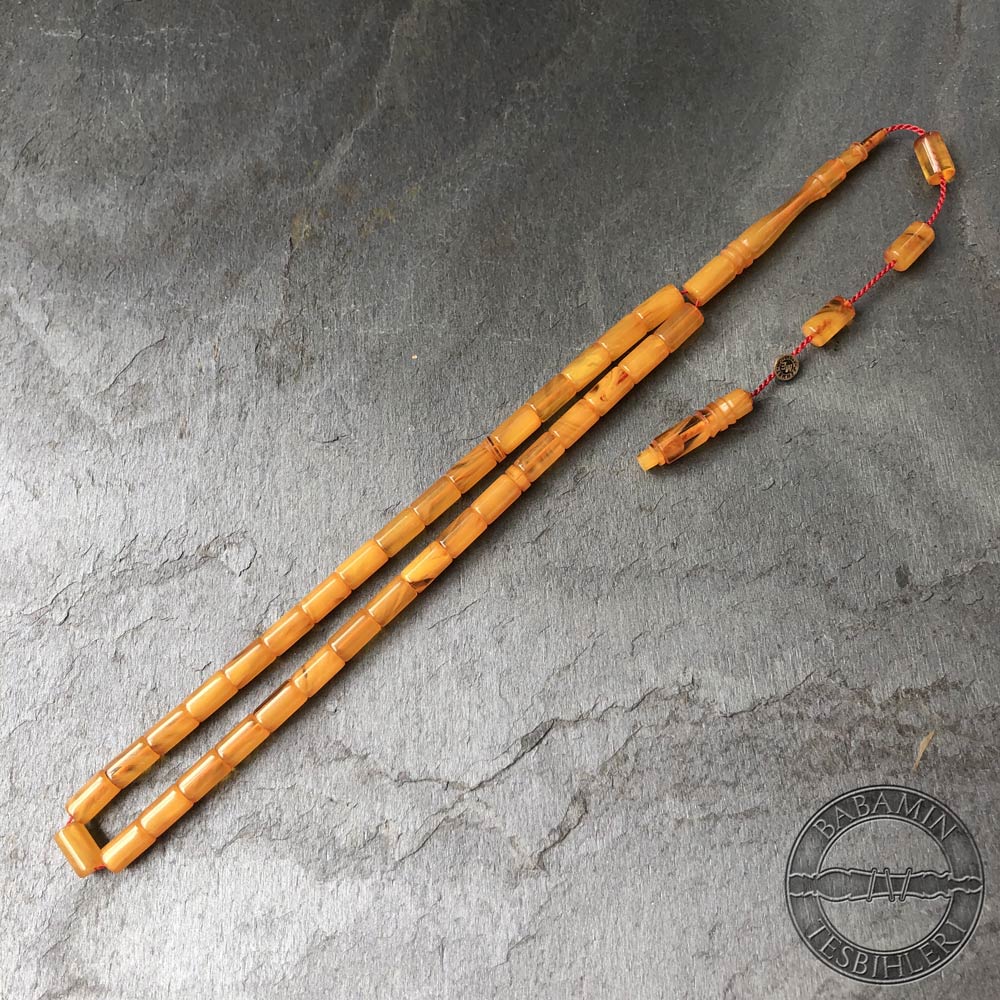 Hareli sarı 5,5x9,5mm sıkma kehribar kesme model tesbih
