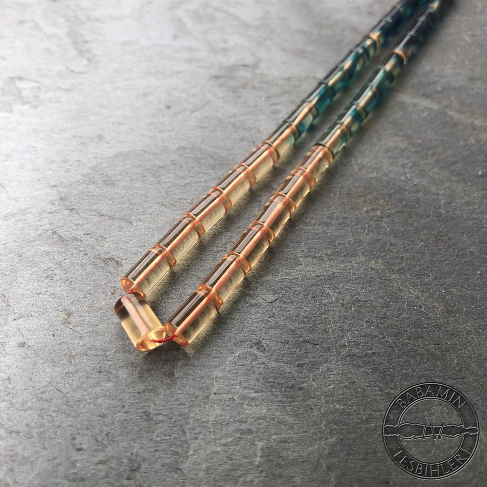 Şeffaf mavi süzme dizim 5,5x9,5mm sıkma kehribar kesme model tesbih