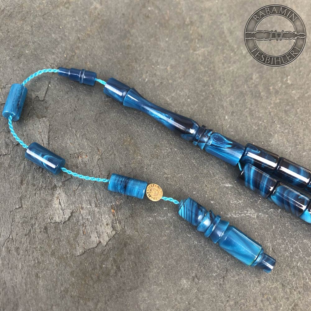 Hareli mavi 6,5×10,5mm sıkma kehribar kesme model tesbih