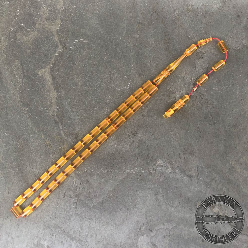 Şeffaf sarı 6,5×10,5mm sıkma kehribar kesme model tesbih