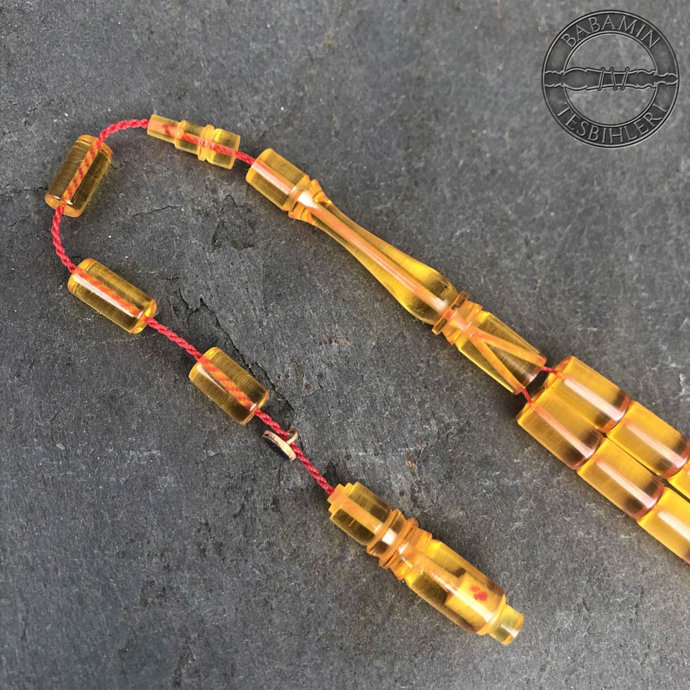 Şeffaf sarı 6,5×10,5mm sıkma kehribar kesme model tesbih