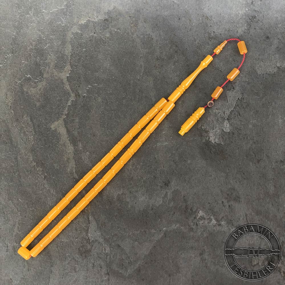 Buğulu sarı 6,5×10,5mm sıkma kehribar kesme model tesbih