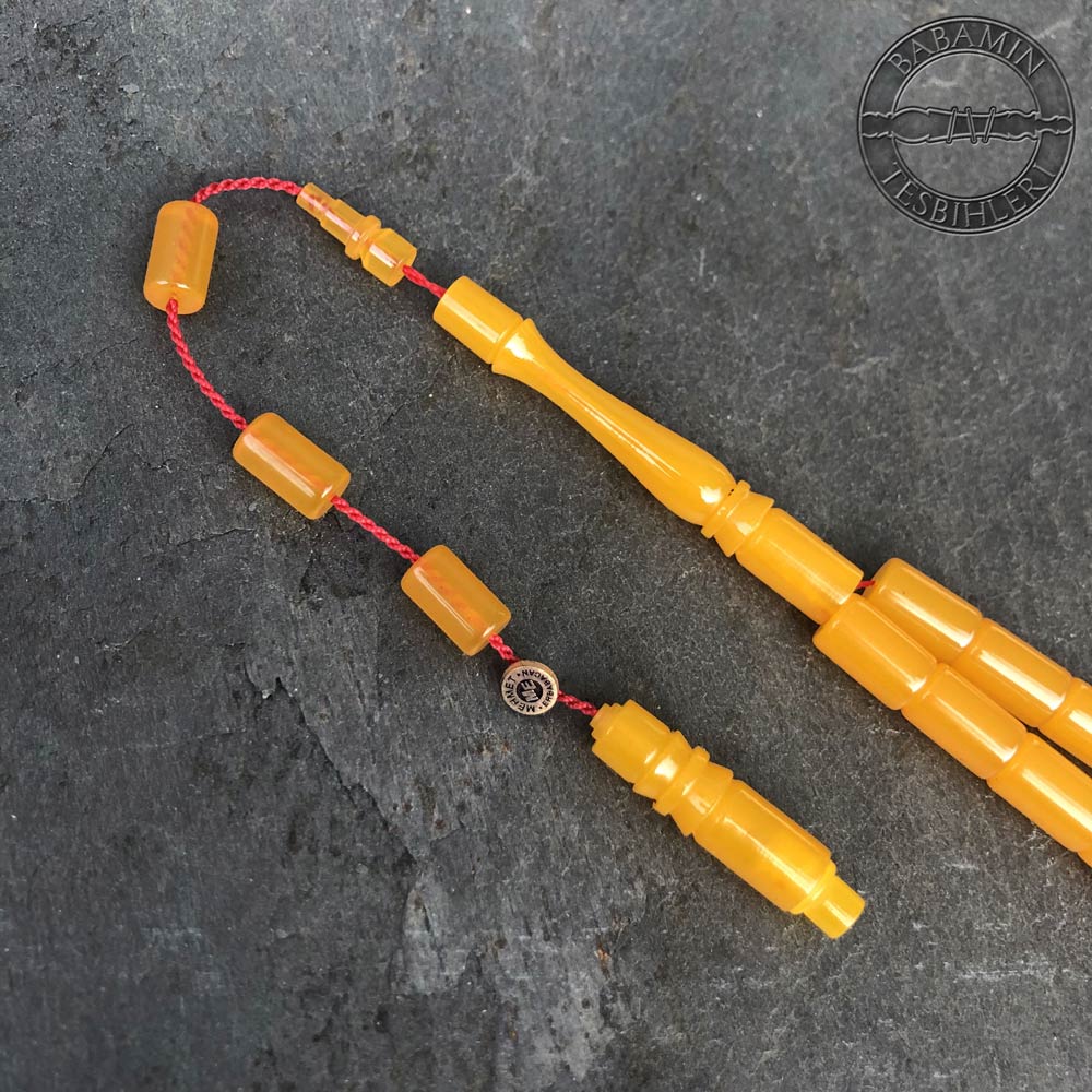 Buğulu sarı 6,5×10,5mm sıkma kehribar kesme model tesbih