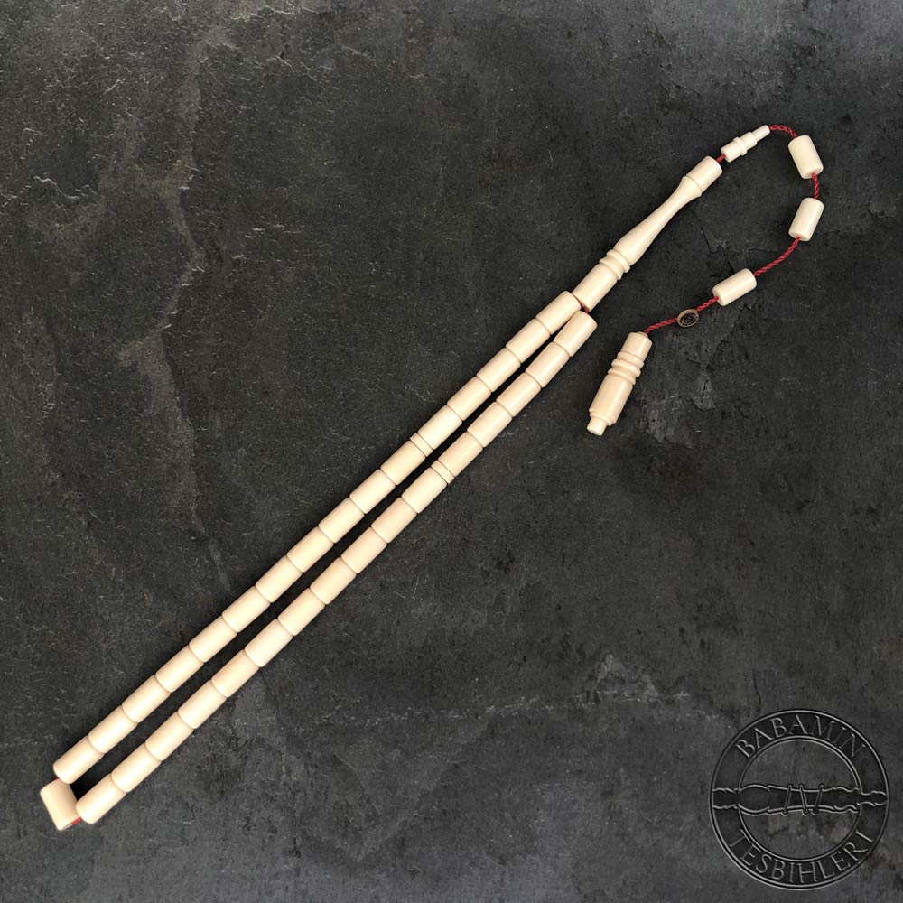 Beyaz 6,5×10,5mm sıkma kehribar kesme model tesbih