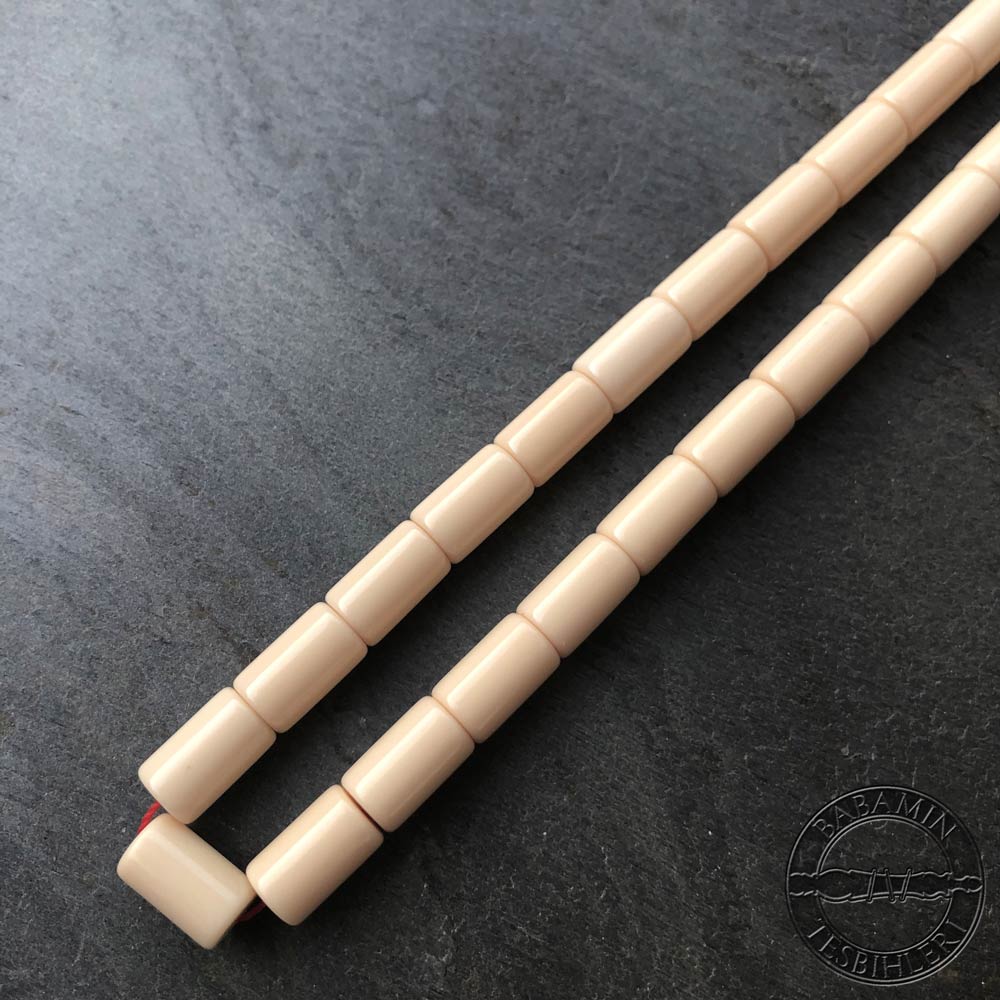 Beyaz 6,5×10,5mm sıkma kehribar kesme model tesbih
