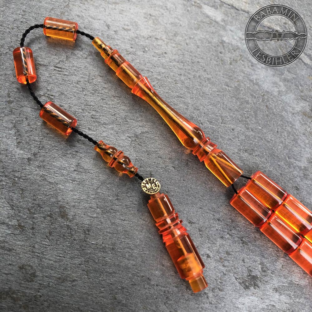 Şeffaf turuncu 6,5×10,5mm sıkma kehribar kesme model tesbih