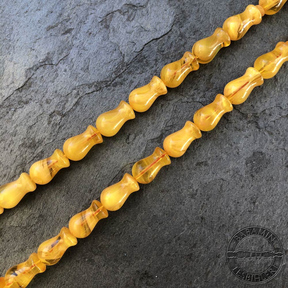 Hareli sarı 7x12mm lale model, sıkma kehribar tesbih