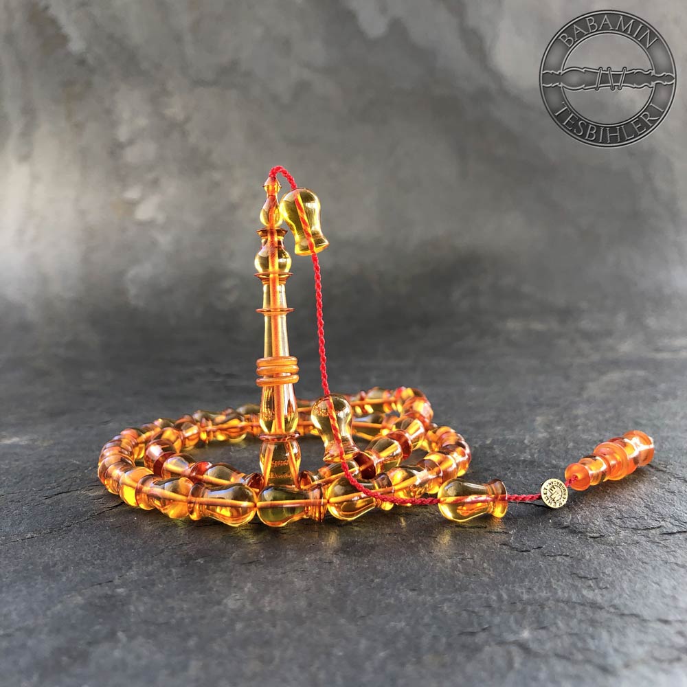 Şeffaf sarı 7x12mm lale model, sıkma kehribar tesbih