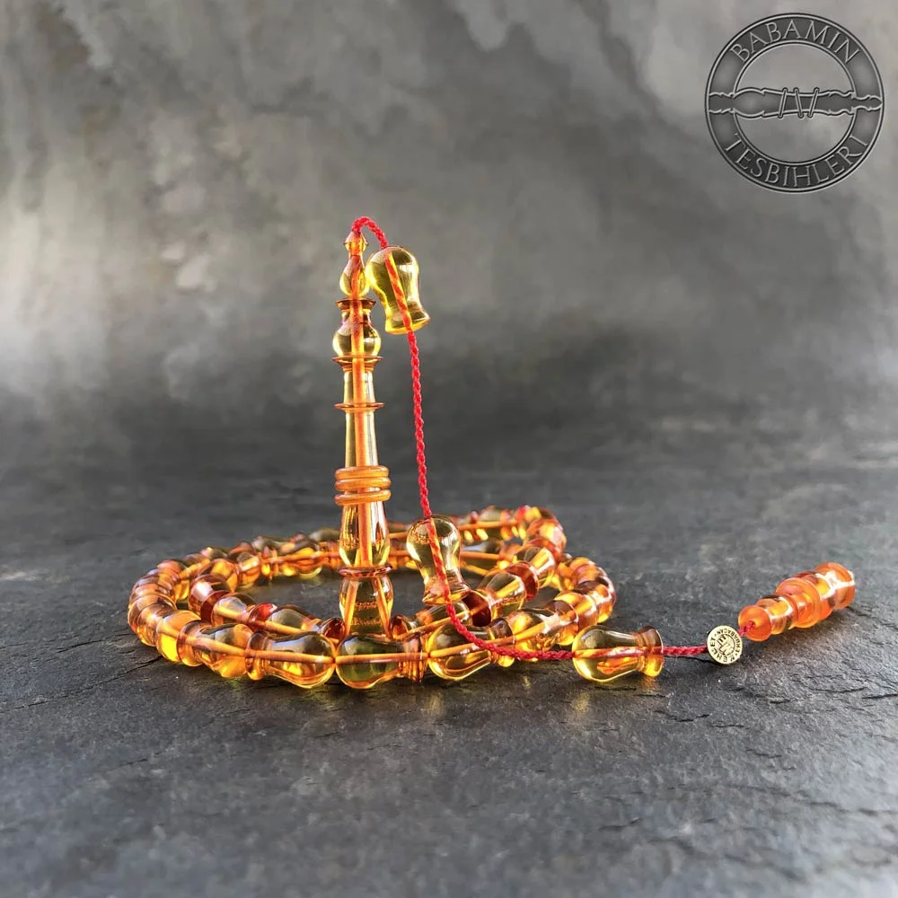 Şeffaf sarı 7x12mm lale model, sıkma kehribar tesbih