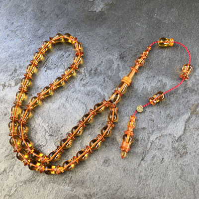 7x12mm Şeffaf Sarı Lale Model Sıkma Kehribar Tesbih